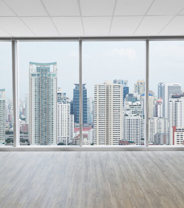 Interior space of modern empty office with city view background