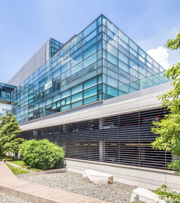 modern building and green footpath