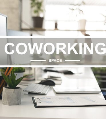 Coworking space. Interior of modern empty workplace with computer, free space