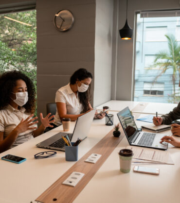 black business woman at conference call, talking online in offic